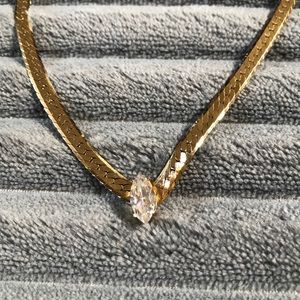 Necklace with large cubic zirconium gem